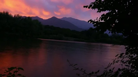 Drops of rain on the lake surface during sunset Stock-Footage 75980551
