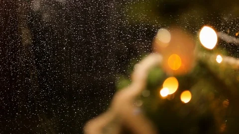 Drops of rain on New Year window glass on the background of the Christmas toys. Stock Footage 70739451