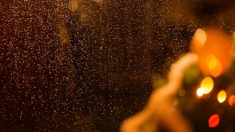 Drops of rain on New Year window glass on the background of the Christmas toys. Stock Footage 70767856