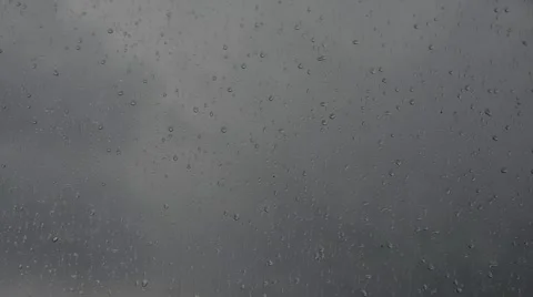 Drops of rain running down the glass Stock Footage 40513027