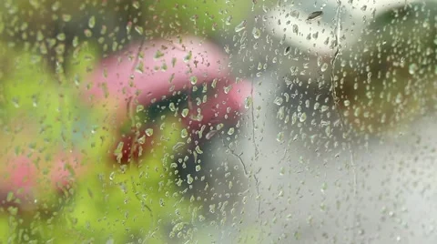 Drops of rain running down a windowpane 스톡 동영상 49678724