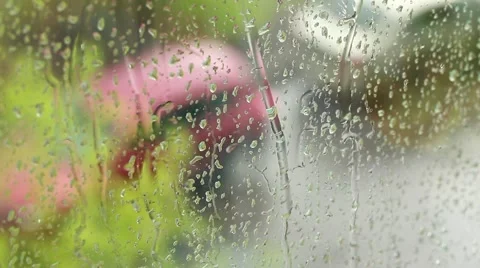 Drops of rain running down a windowpane 스톡 동영상 49679067