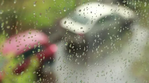 Drops of rain running down a windowpane 스톡 동영상 49679250