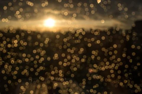 Drops of rain on window after a storm. Water drops on the glass after rain. Stock Photos