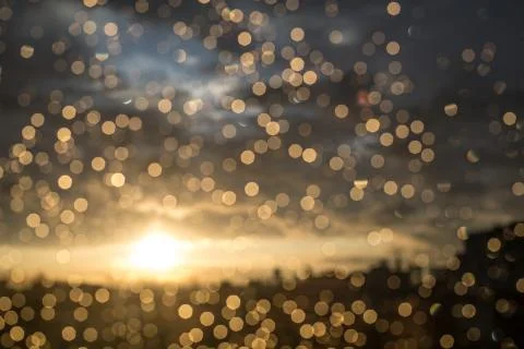 Drops of rain on window after a storm. Water drops on the glass after rain. Stock Photos