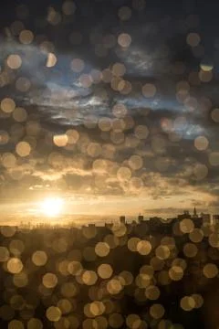 Drops of rain on window after a storm. Water drops on the glass after rain. Stock Photos