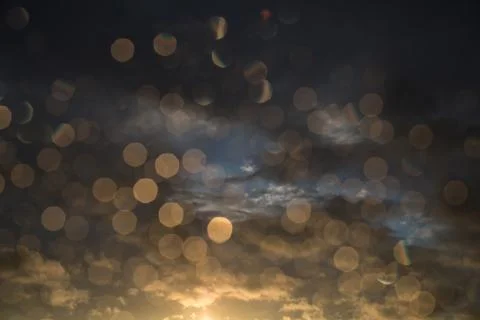 Drops of rain on window after a storm. Water drops on the glass after rain. Stock Photos