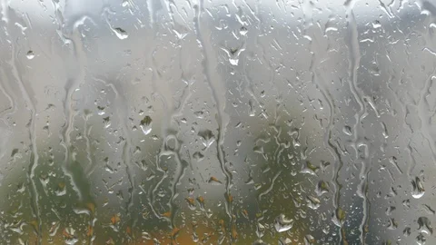 Drops of rain on a window Stock Footage 121635865