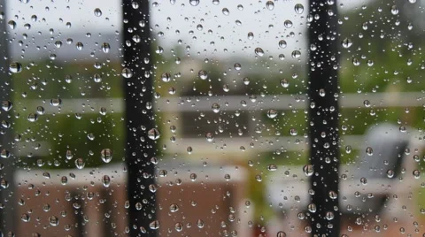 Drops of rain on window glass. Raining. 4K Stock Footage 49318692