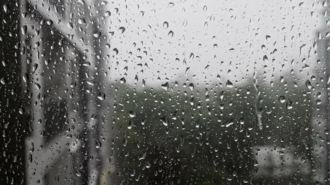 Drops of rain on a window pane, Torrenti... | Stock Video | Pond5