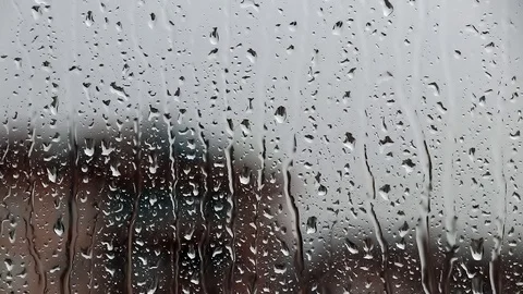 Drops of rain on window surface Stock Footage 104330209