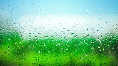 Drops of rain on window. Time lapse 動画素材 52554546