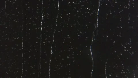 Drops of rain on the windows and thunderstorm in the night Video stock 157654222