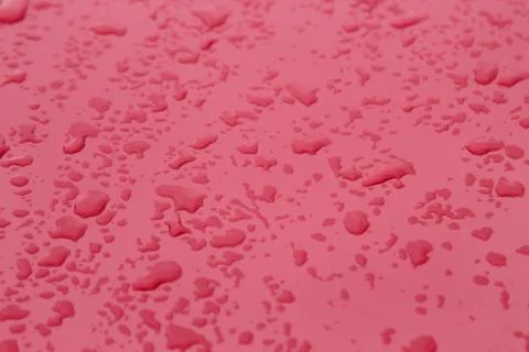 Drops on red background. Stock-Fotos