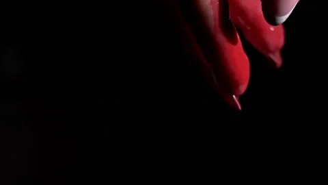 Drops of Red Blood Drip from Hands in Slow-mo Close-up Stock Footage 214054917