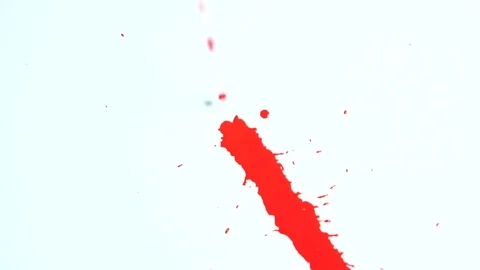 Drops of red liquid dripping from above on a white background. Video stock 81576097