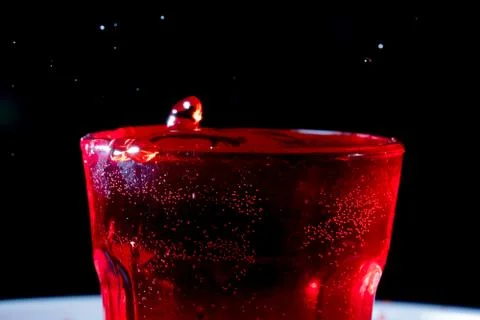 Drops of red liquid Stock Photos