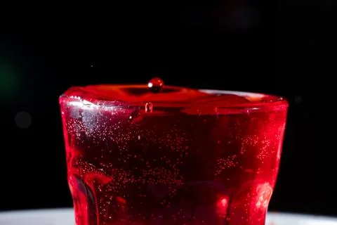 Drops of red liquid Stock Photos