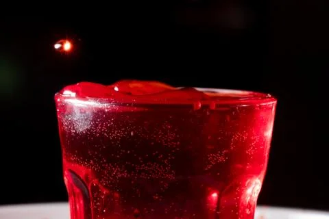 Drops of red liquid Stock Photos