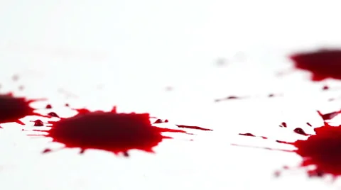Drops of red liquid on white background Stock-Footage 42985910