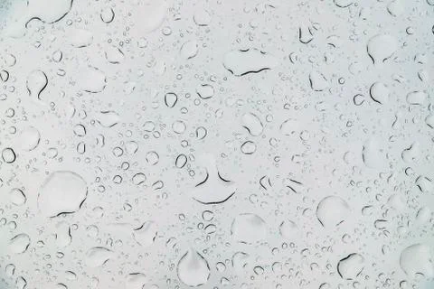 Drops reflected in the transparent window Stock Photos