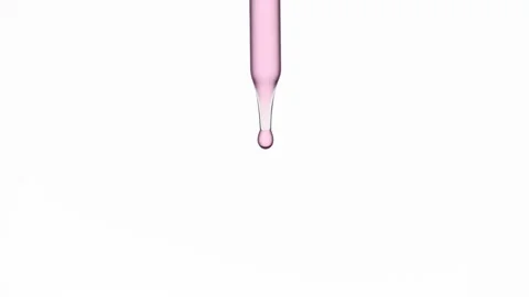 Drops of rose water are falling down from lab dropper Stock Footage 167322449