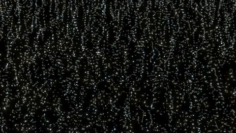 Drops splash water waterfall on black bg Stock Footage 325131359