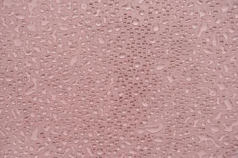 Drops splatter pattern on neutral pink background. Minimalist beauty template Stock Photos