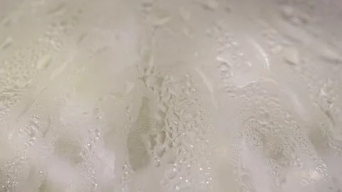 Drops of steam flow down the glass Stock Footage 97073127
