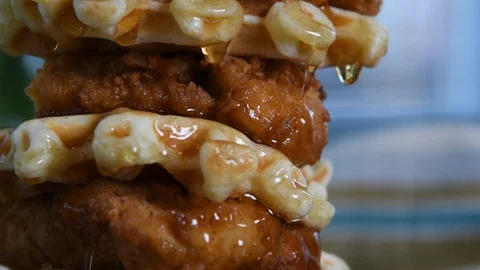 Drops of Syrup Fall from Chicken and Waffles Close Up Video stock 88834001