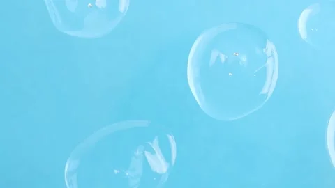 Drops of transparent texture on a blue background. Video stock 170476536