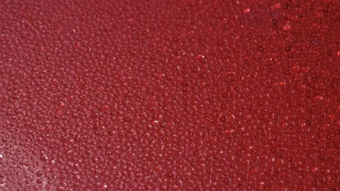 Drops of water. Abstract background. Red base. Stockbeeldmateriaal 141549170