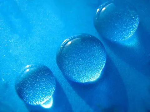 Drops of water in blue Stock Illustration