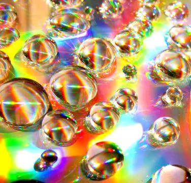 Drops of water on the compact disk Stock Photos