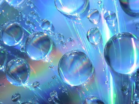 Drops of water on the compact disk Stock Photos