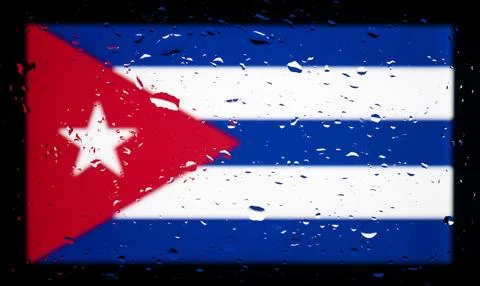Drops of water on Cuba flag background. Shallow depth of field. Selective f.. Stock Photos