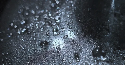 Drops of Water on Dark Surface Stock Footage 121443329