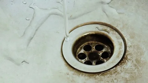 Drops of water drip into the sink Stock Footage 79099449