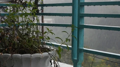 Drops of water dripping from the railing on the balcony during heavy rain Stock Footage 119502906