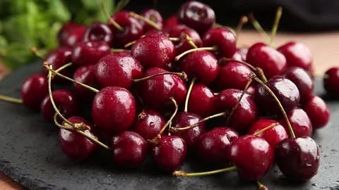 Drops of water fall on cherries Stock Footage 157159788