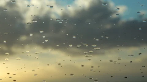 Drops of water fall on the windshield of a car during rain. New Mexico Stock Footage 122530984