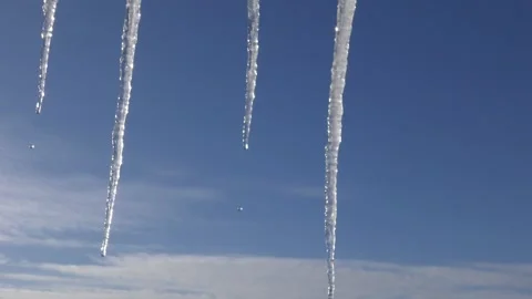 Drops of water falling from icicles Stock Footage 150740312