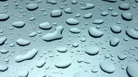 Drops of water falling on a surface of glass Stock Footage 47400067