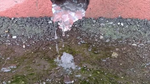 Drops of water flowing from the ice - slow motion frame Stock Footage 168347931