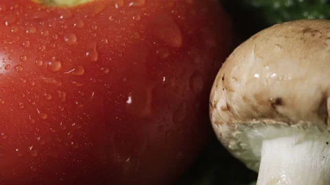 Drops of water on fresh vegetables, close up of a drop of water dripping from Stock Footage 130241276