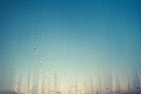 Drops of water on the glass surface. Background. Stock-Fotos