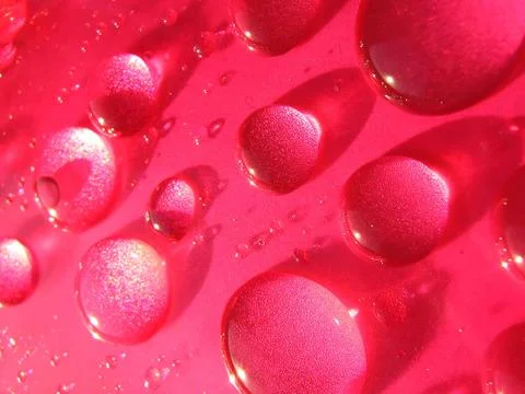 Drops of water in red Stock Illustration