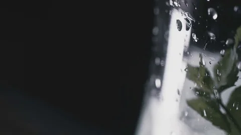 Drops of water roll down the flask for the hookah Stock Footage 77346019