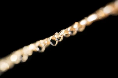 Drops of water on a rope. macro Stock Photos
