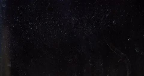 Drops of water run down the dirty glass Stock Footage 238778194
